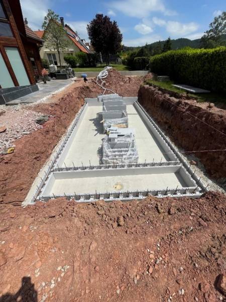Réalisation d'une piscine extérieure à St Pierre Bois